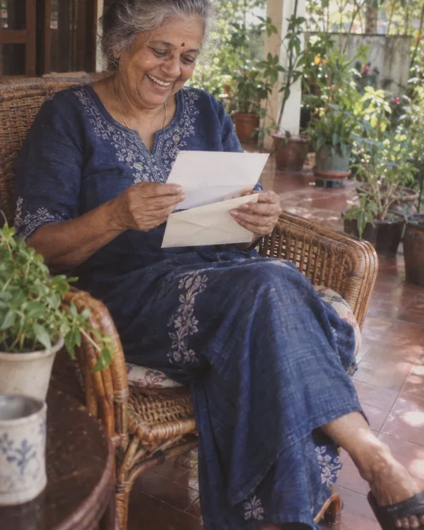 A person enjoying a handwritten letter