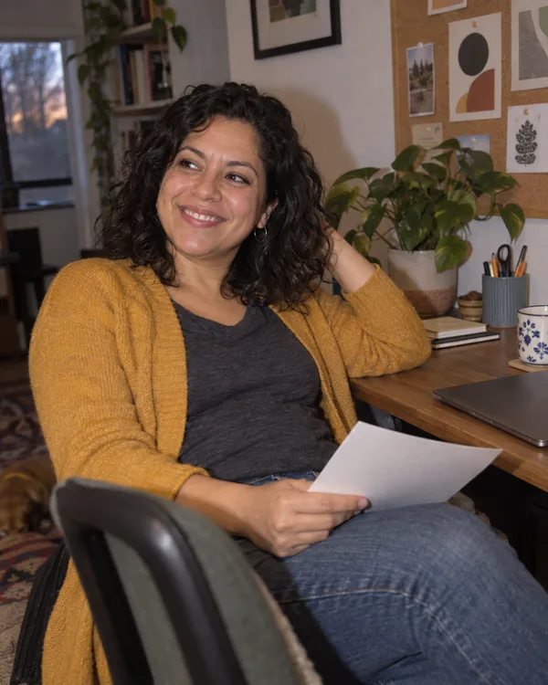 A person enjoying a handwritten letter